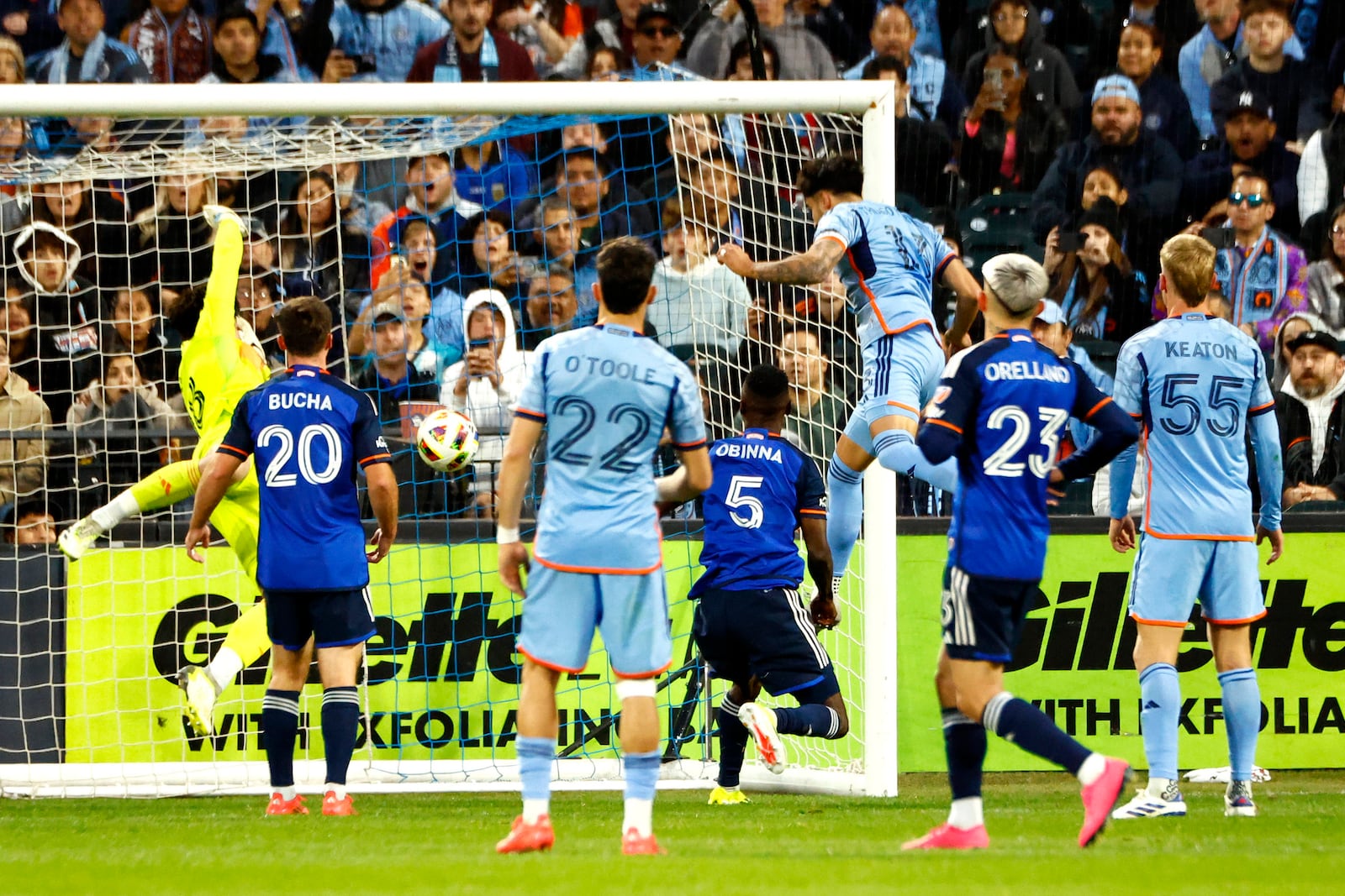 New York City FC's Thiago Martins (13), third from right, scores a goal against FC Cincinnati during the first half in Game 2 in the first round of the MLS Cup soccer playoffs, Saturday, Nov. 2, 2024, in New York. (AP Photo/Kena Betancur)