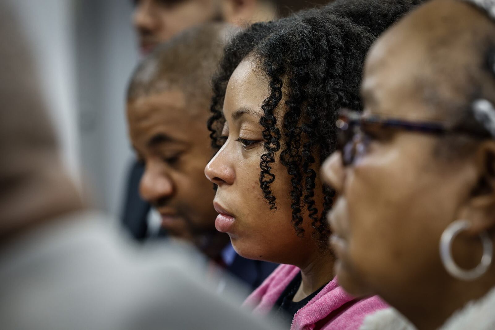 Michelle Cooper, right and Brittney Cooper, center, meet with the press Wednesday December 7, 2022 at Wright and Schulte law office in Dayton. The Coopers filed a lawsuit accusing Lyft of failing to protect Brandon Cooper after he was gunned down during a robbery earlier this year. Brittney was Brandon's wife and Michelle was Brandon's mother. JIM NOELKER/STAFF