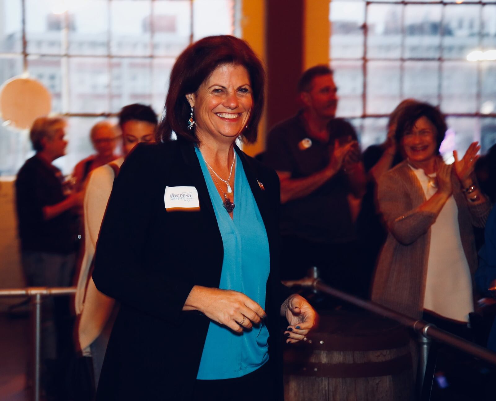 Democratic candidate Theresa  Gasper  arrives at her election night party on Tuesday. Gasper is running in the primary for the 10th Congressional district against Michael Milisites and Robert Klepinger. TY GREENLEES / STAFF