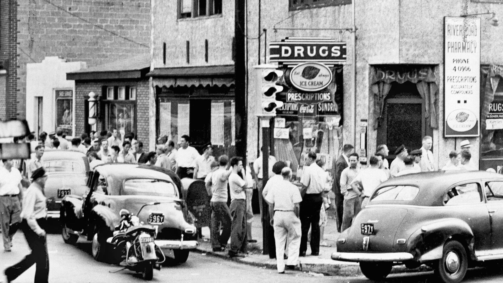 Pictured is the scene on Sept. 6, 1949, in Camden, New Jersey, where 28-year-old World War II veteran Howard Unruh committed what is considered the first mass shooting in U.S. history. Unruh, who lived in an apartment above the drugstore in the photo, shot and killed the pharmacist, his wife and his mother, as well as other victims in the neighboring barbershop and shoe repair shop. In all, 13 people died that day.