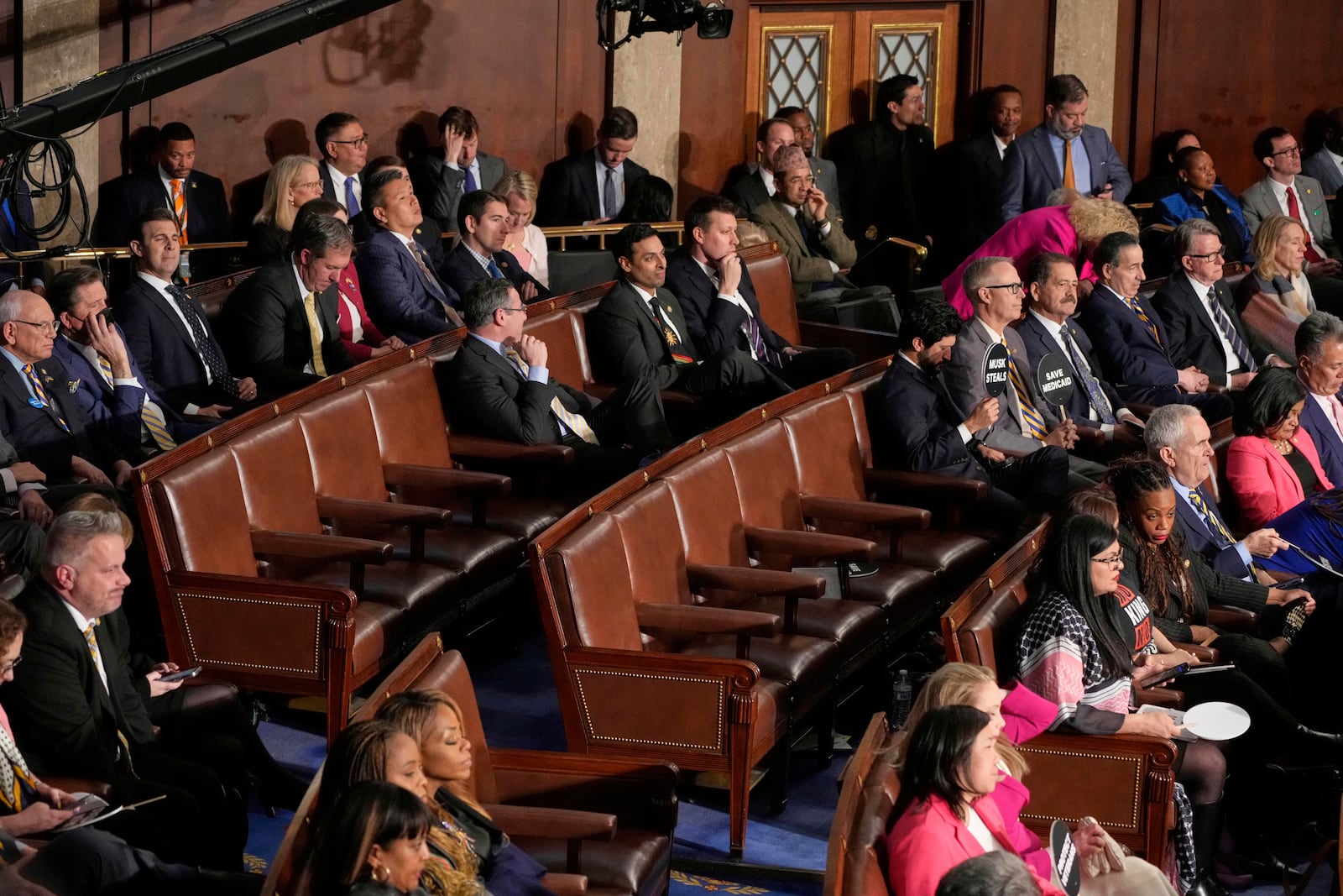 Seats are empty on the Democratic side of the aisle as President Donald Trump addresses a joint session of Congress in the House chamber at the U.S. Capitol in Washington, Tuesday, March 4, 2025. (AP Photo/Julia Demaree Nikhinson)