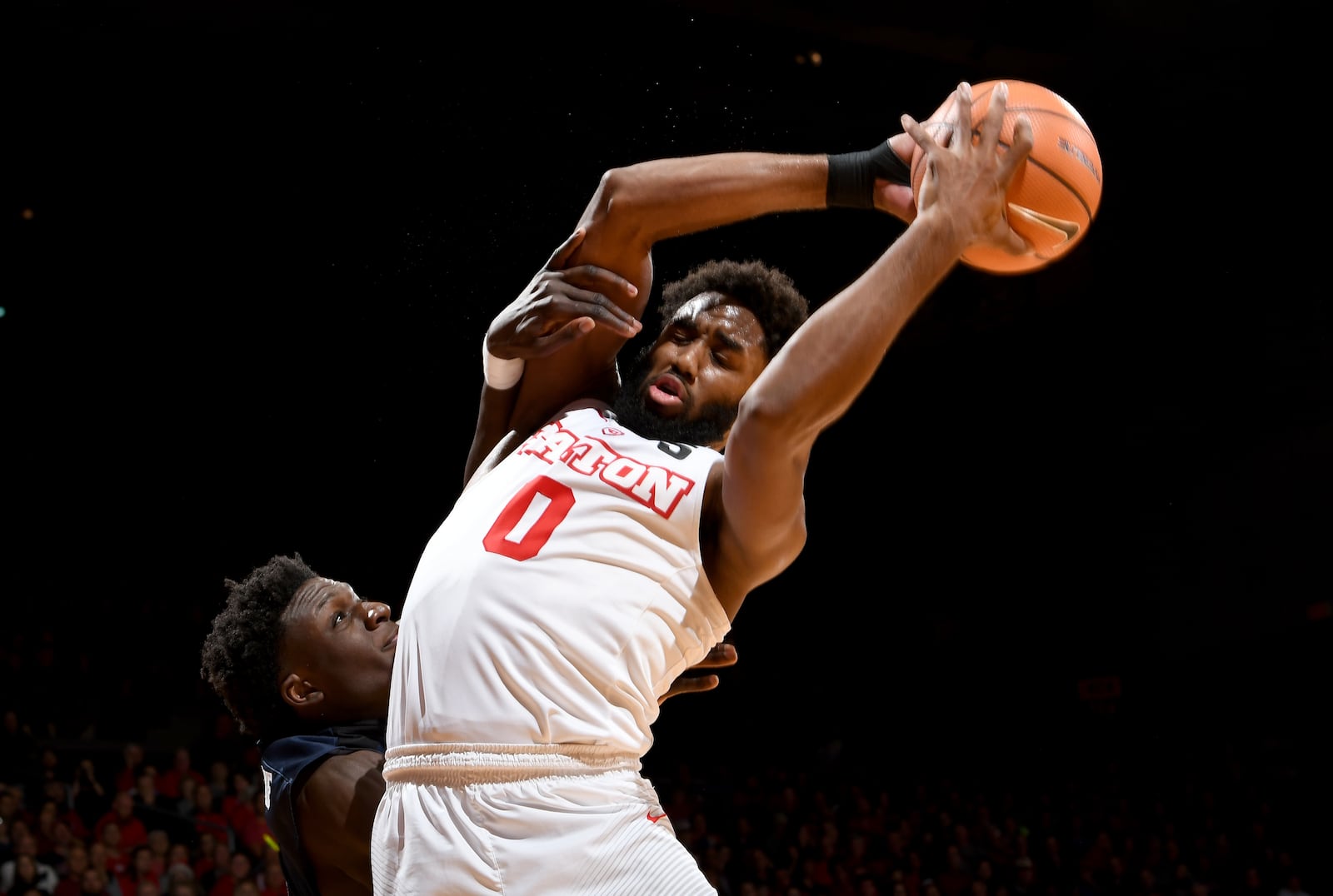 Josh Cunningham pulls down a rebound against Akron at UD Arena on Saturday, Nov. 25, 2017. Erik Schelkun/CONTRIBUTED