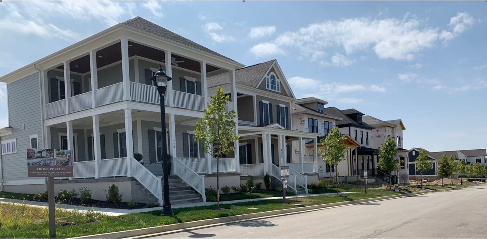 Builders are working on the construction of new homes at Union Village which will be the site of the 2021 Dayton Homearama. Premier Health will be opening a new health center at Union Village on Tuesday. ED RICHTER/STAFF