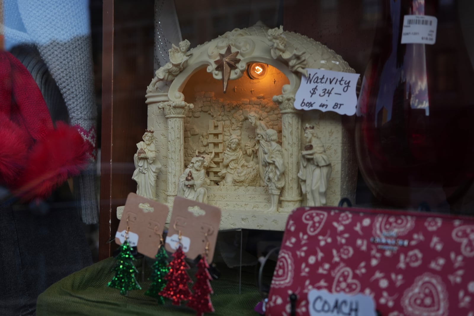 A Nativity scene on display on store front in Bethlehem, Pa., on Sunday, Dec. 1, 2024. (AP Photo/Luis Andres Henao)