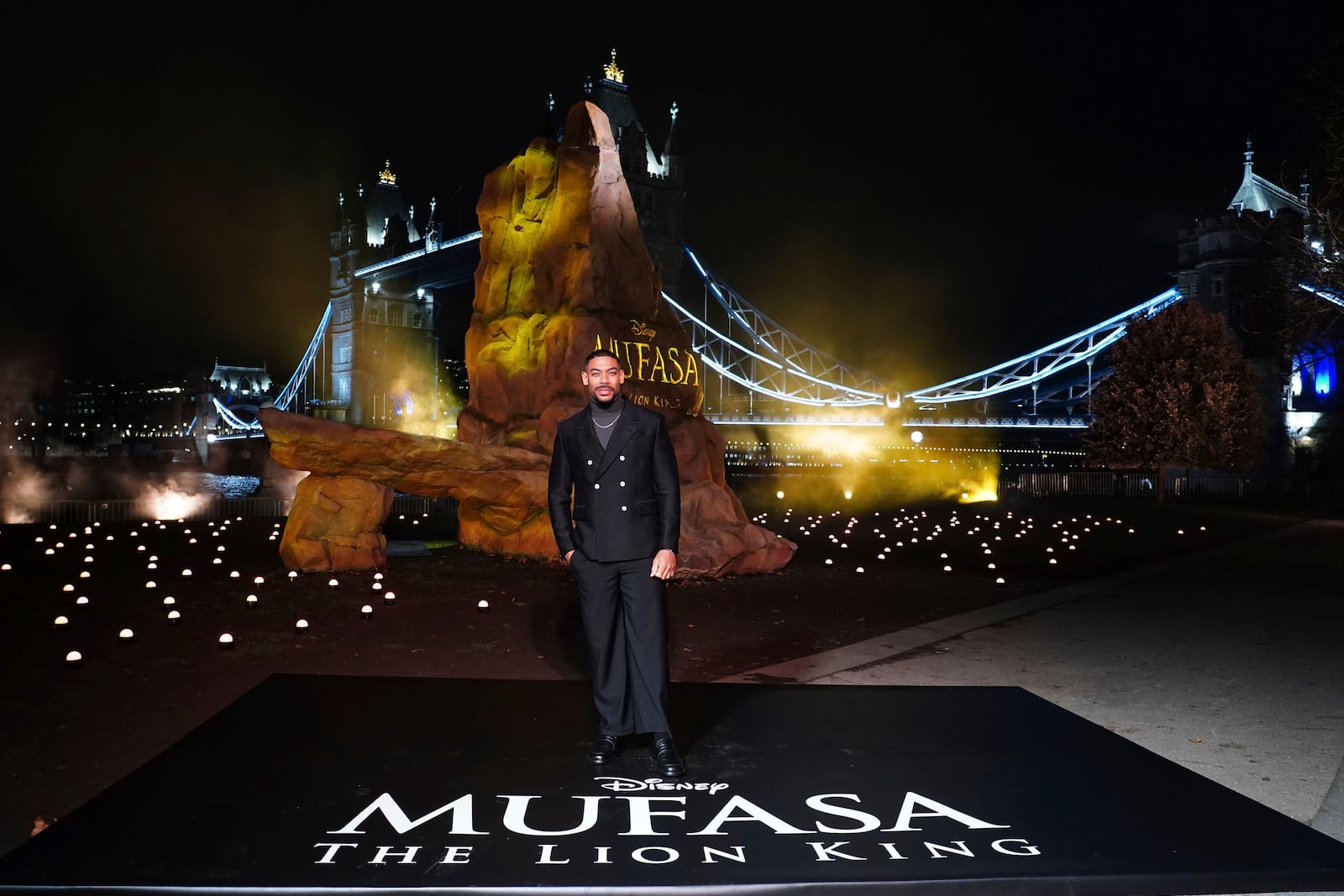 Aaron Pierre attends a photo call for Mufasa: The Lion King at Potters Field, in London, Wednesday, Dec. 11, 2024. (Ian West/PA via AP)