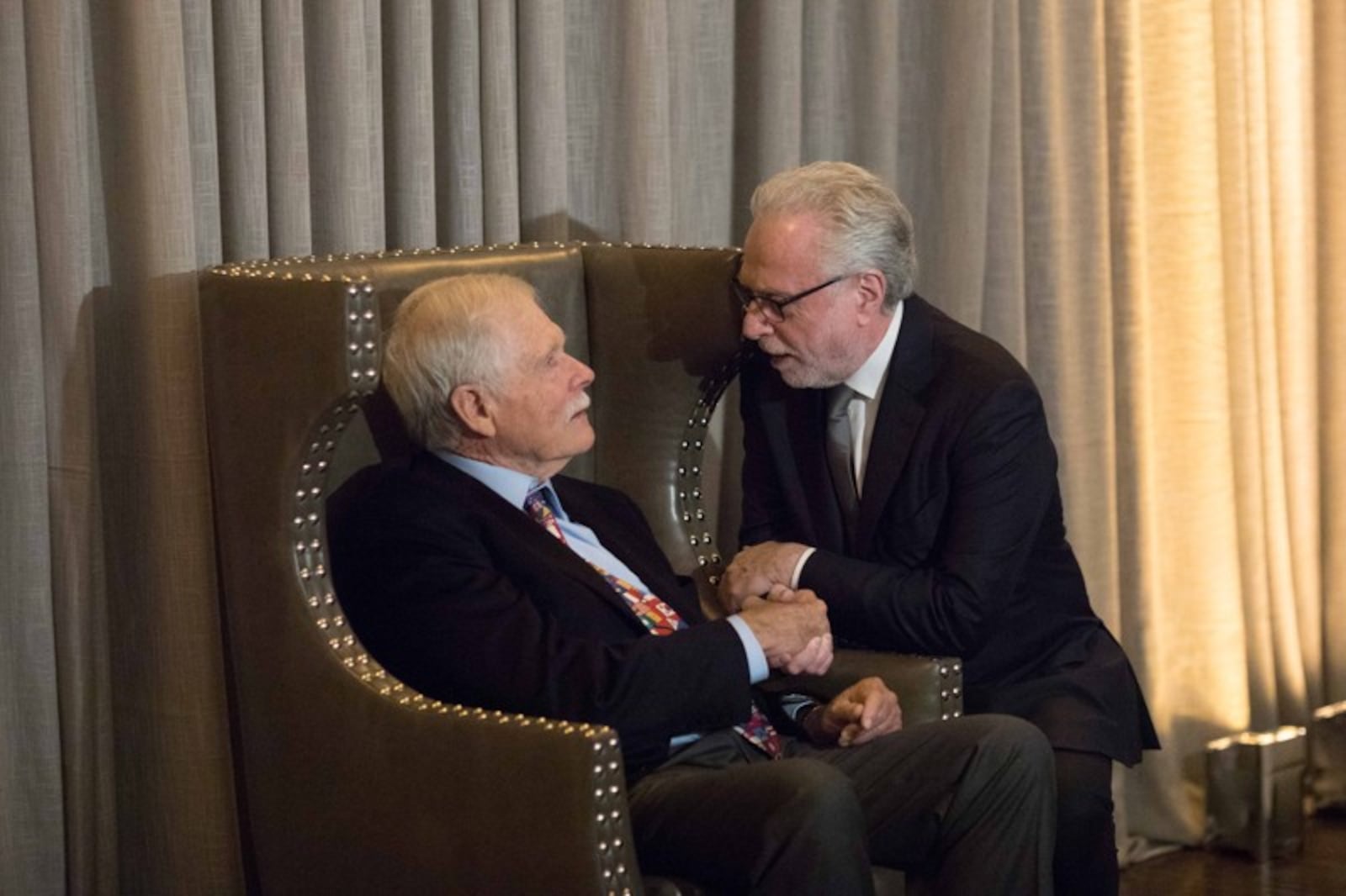 ed Turner talks with CNN anchor Wolf Blitzer during Turner's 80th birthday party at the St. Regis Atlanta hotel on Saturday, Nov. 17, 2018. Turner was the founder of CNN, the first 24-hour news network.