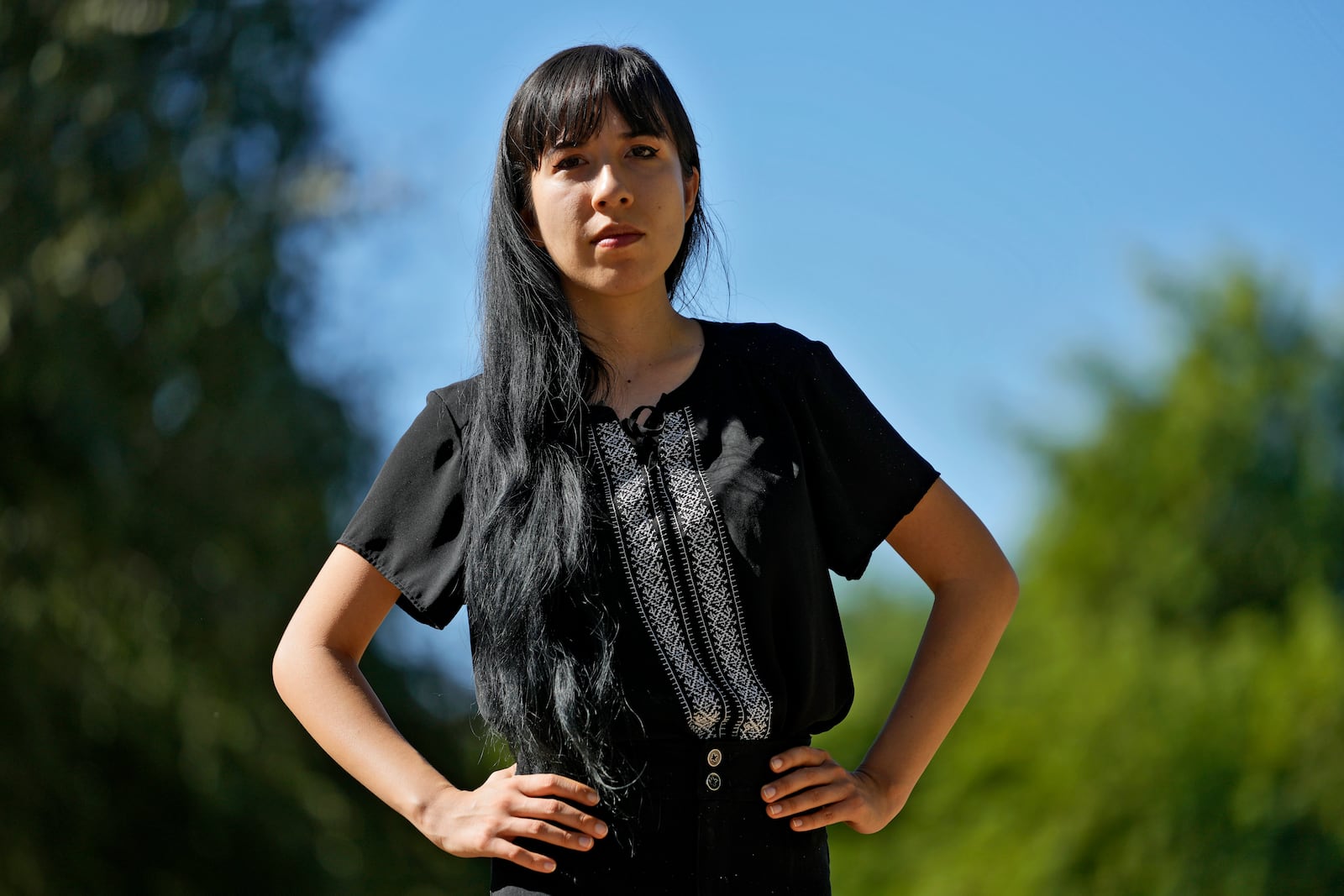 Jocelyn Ruiz, 26, pictured in Tempe, Ariz., Tuesday, Oct. 22, 2024, is a U.S. citizen who discovered a family secret that her mother could be deported at any time. (AP Photo/Matt York)