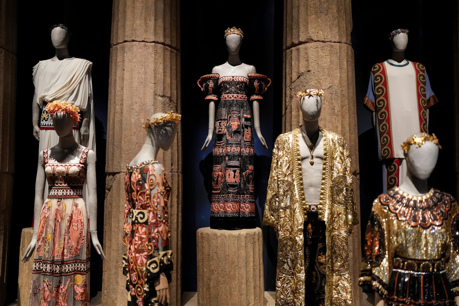 Creations are displayed during the exhibition "From the Heart to the Hands: Dolce&Gabbana" at the Grand Palais, in Paris, Thursday, Jan. 9, 2025. (AP Photo/Thibault Camus)