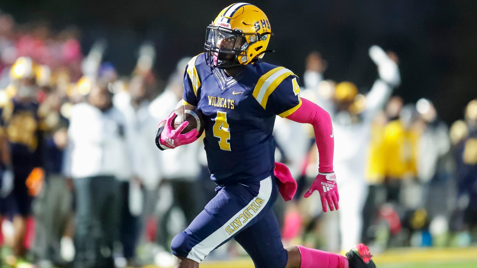 Springfield High School junior Jayvin Norman runs the ball during their game against Miamisburg on Friday night in Springfield. Norman scored a touchdown on the play. 
CONTRIBUTED PHOTO BY MICHAEL COOPER