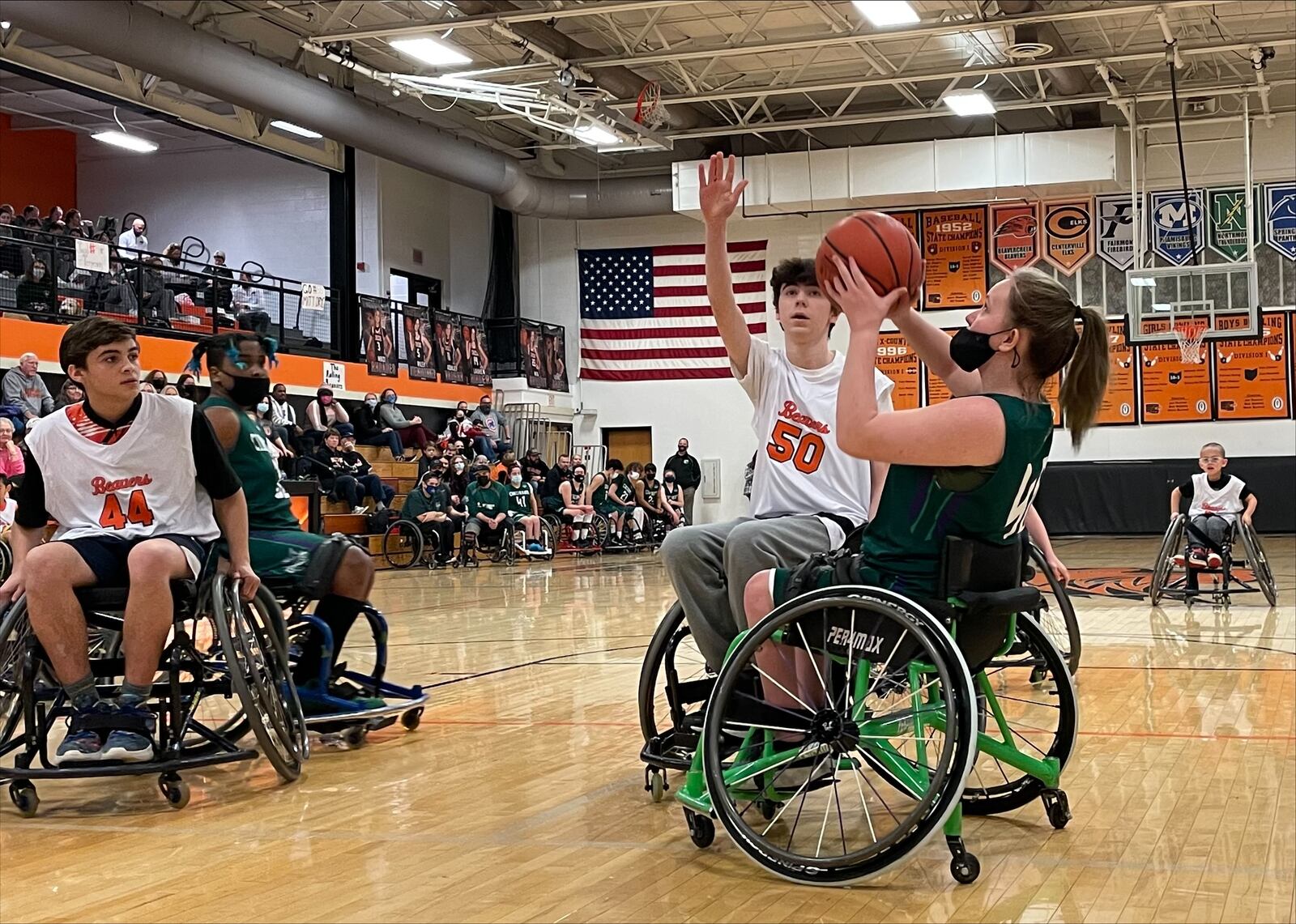 The Rolling Beavers play defense against the Cincinnati Dragons during the team's first-ever home game Saturday.