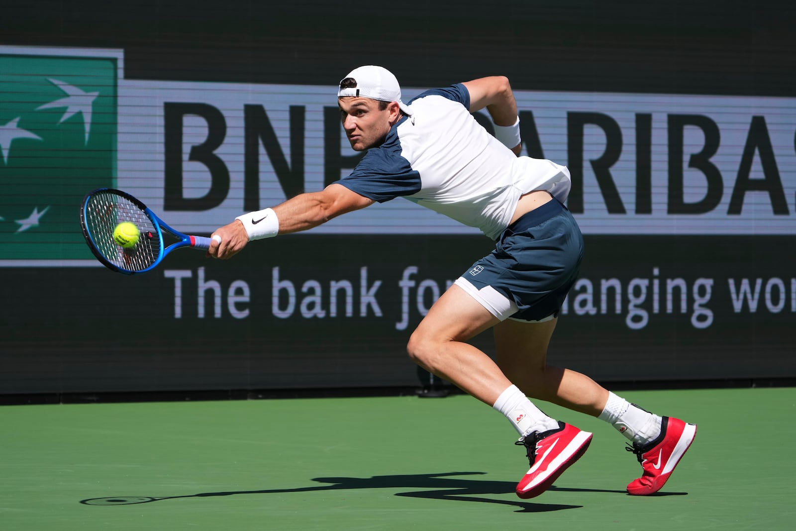 Jack Draper, of Great Britain, returns to Holger Rune, of Denmark, during the final match at the BNP Paribas Open tennis tournament Sunday, March 16, 2025, in Indian Wells, Calif. (AP Photo/Mark J. Terrill)