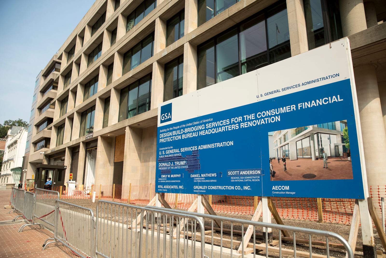 FILE - A sign stands at the construction site for the Consumer Financial Protection Bureau's headquarters in Washington, Aug. 27, 2018. (AP Photo/Andrew Harnik, file)