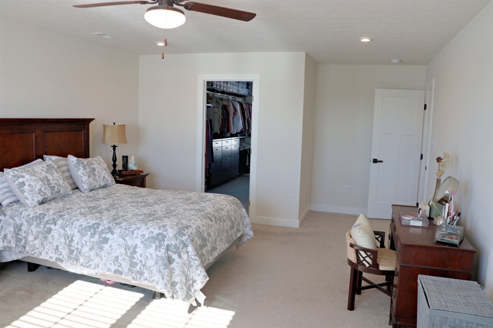 The primary bedroom has a sitting room and a large walk-in closet with window and built-in storage organizers. CONTRIBUTED BY KATHY TYLER