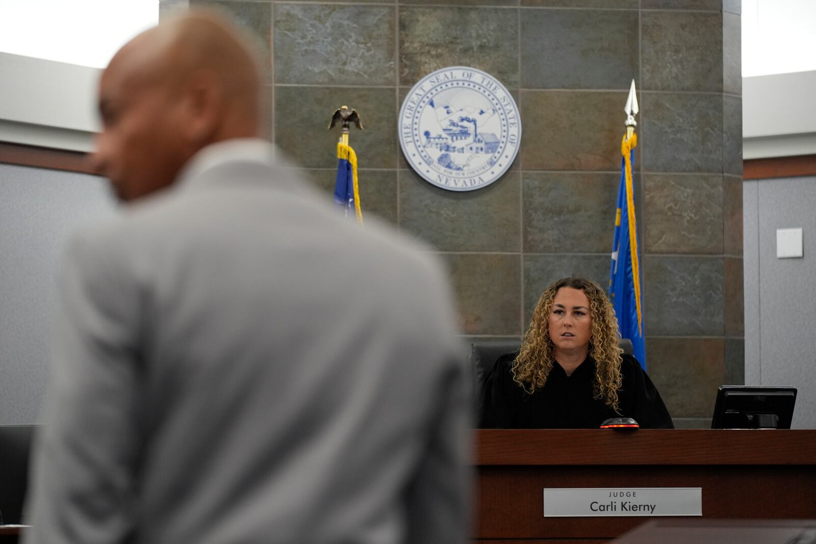 Carl E.G. Arnold, left, attorney for Duane "Keffe D" Davis, listens with District Judge Carli Kierny, right, during an appearance by Davis for for his involvement in the 1996 killing of rapper Tupac Shakur Tuesday, Feb. 18, 2025, in Las Vegas. (AP Photo/John Locher, Pool)