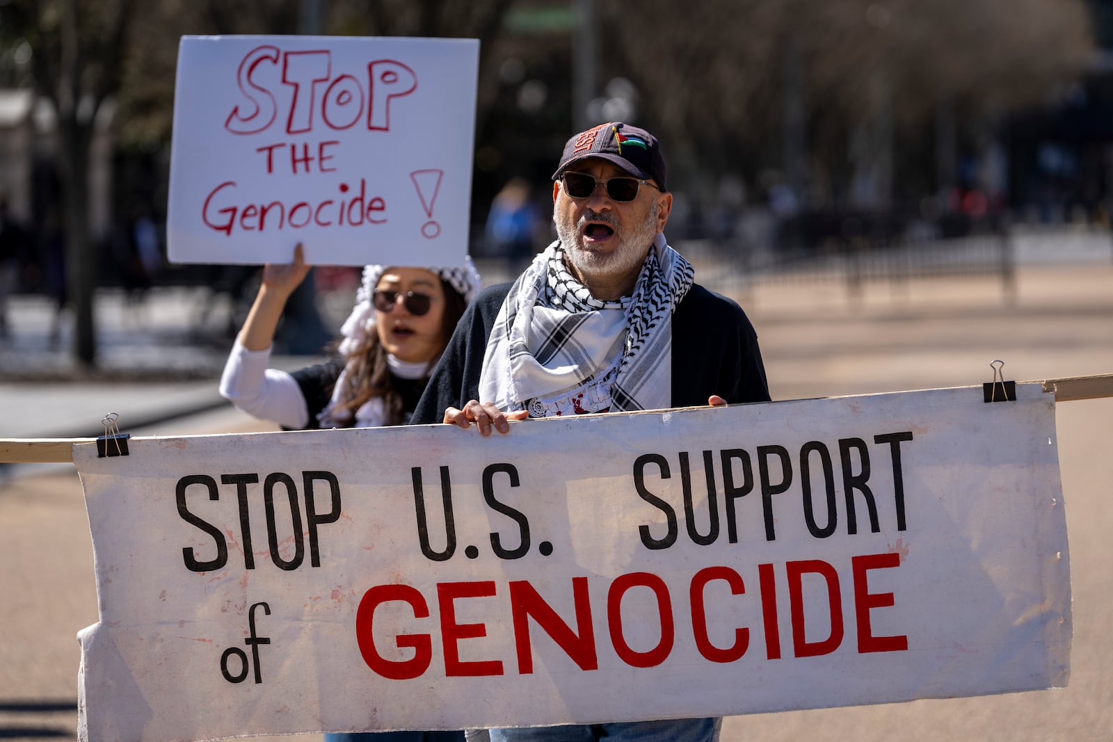 People protest against the war in Gaza outside the White House in Washington, Tuesday, March 18, 2025. (AP Photo/Ben Curtis)