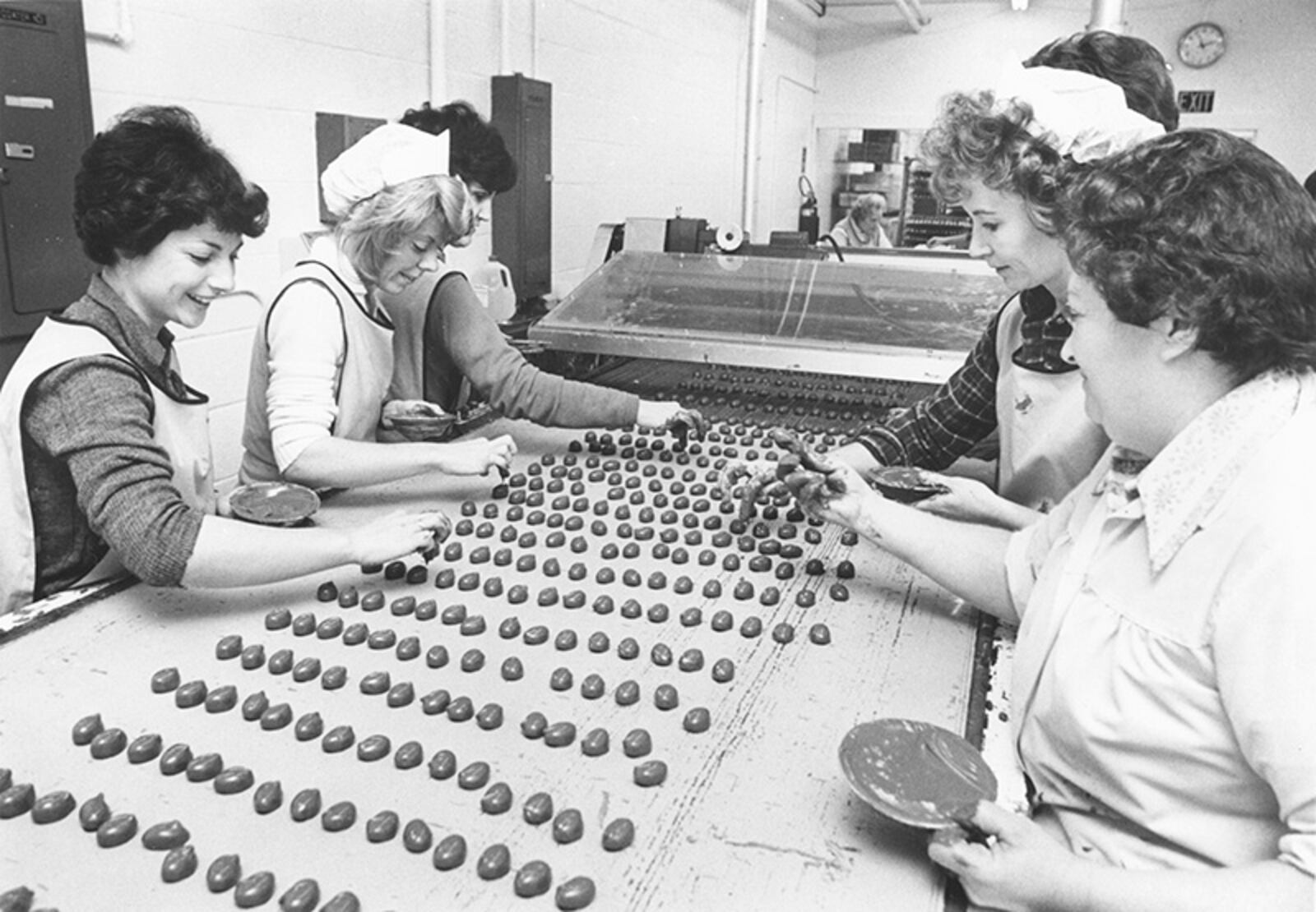 (30 Jan. 1979): Workers putting finishing touches on candy at Esther Price Candies. DAYTON DAILY NEWS ARCHIVES