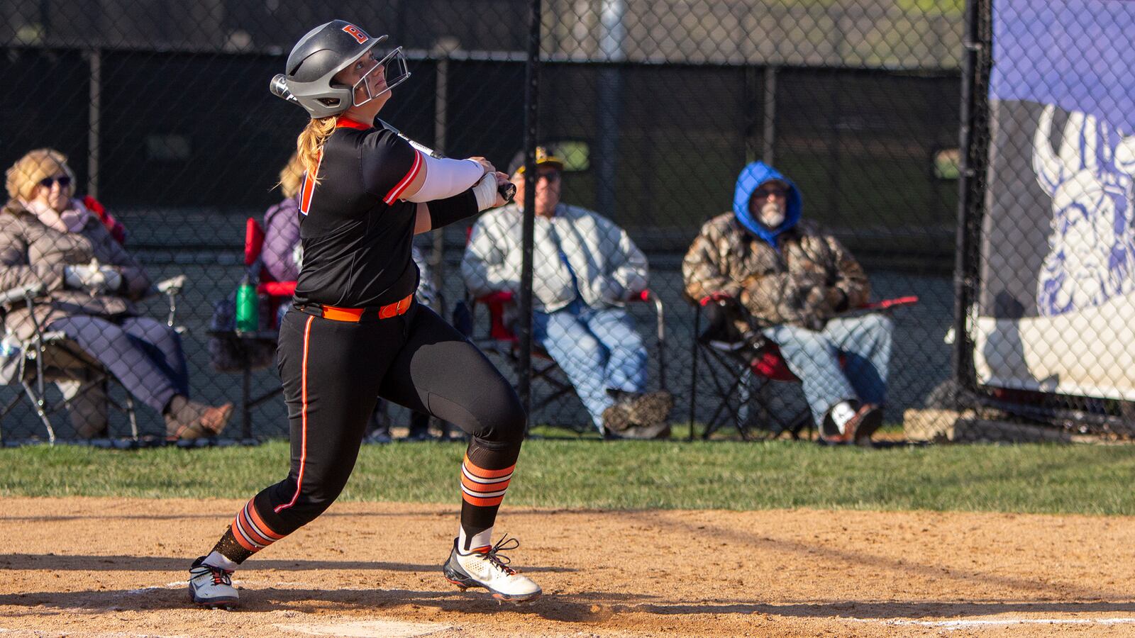 Beavercreek senior catcher Molly Koesters watches her second home run and seventh of the season leave the park in Tuesday's 4-1 victory at Miamisburg. Koesters is batting .650 with 25 RBIs. Jeff Gilbert/CONTRIBUTED