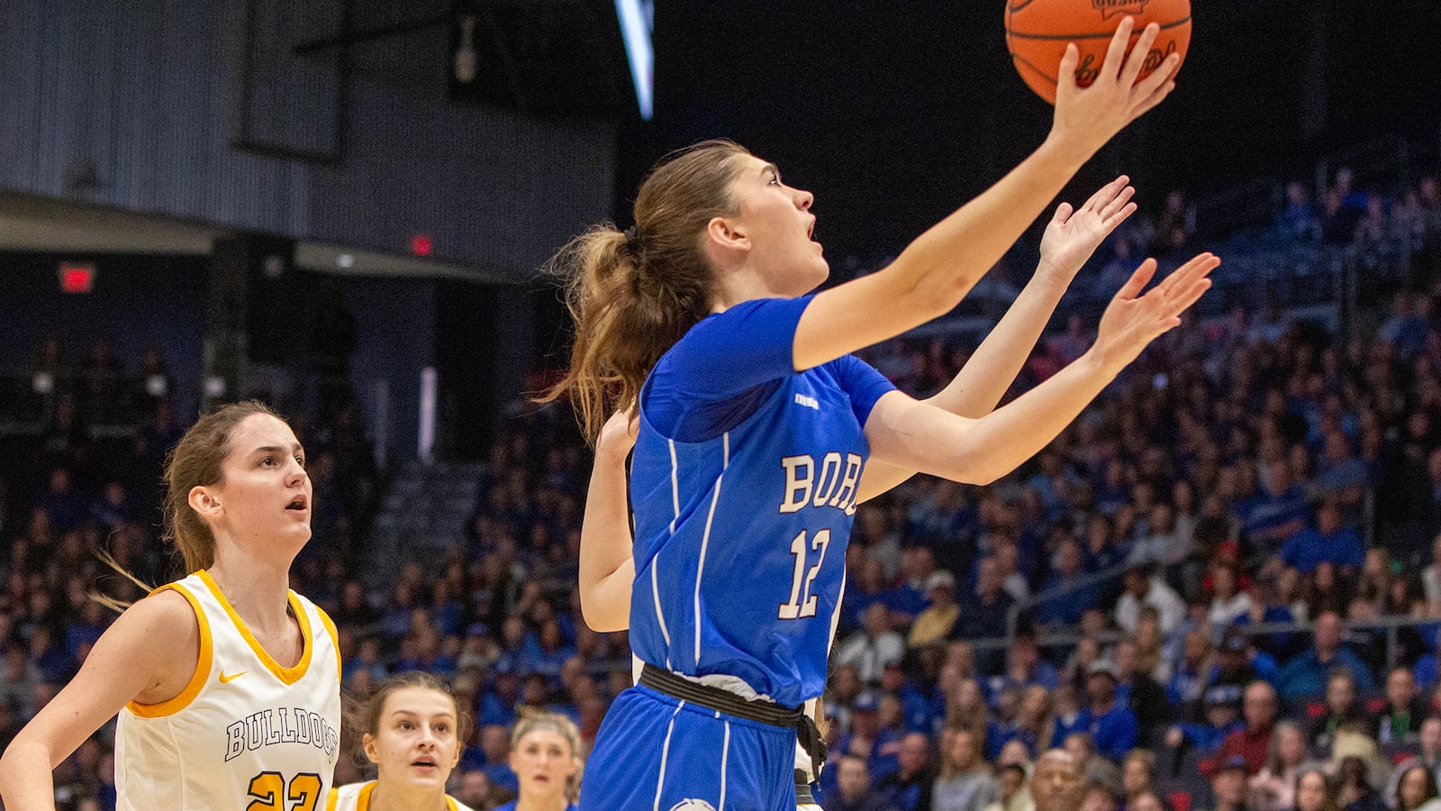 Springboro's Bryn Martin scores during Saturday night's Division I state title game against Olmsted Falls at UD Arena. Jeff Gilbert/CONTRIBUTED