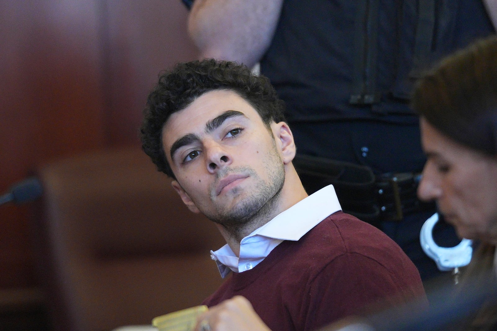 Luigi Mangione appears in Manhattan Criminal court for his arraignment on state murder and terror charges in the killing of UnitedHealthcare CEO Brian Thompson, Monday, Dec. 23, 2024, in New York. (Curtis Means/Pool Photo via AP)