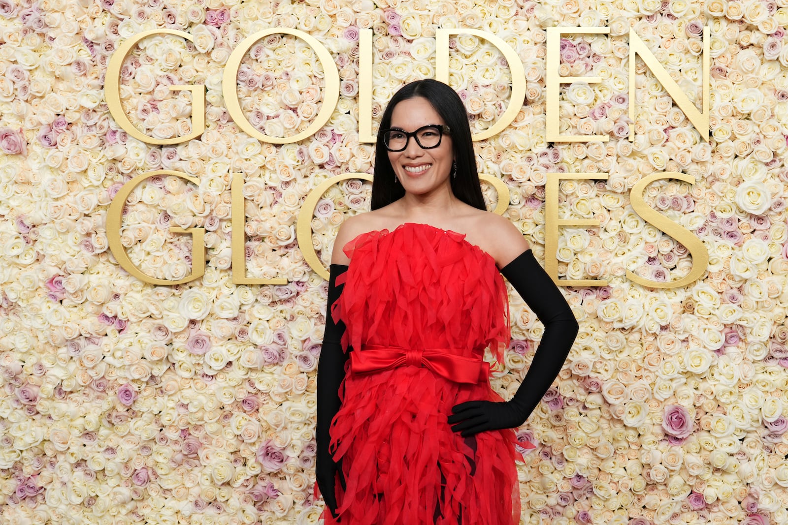 Ali Wong arrives at the 82nd Golden Globes on Sunday, Jan. 5, 2025, at the Beverly Hilton in Beverly Hills, Calif. (Photo by Jordan Strauss/Invision/AP)