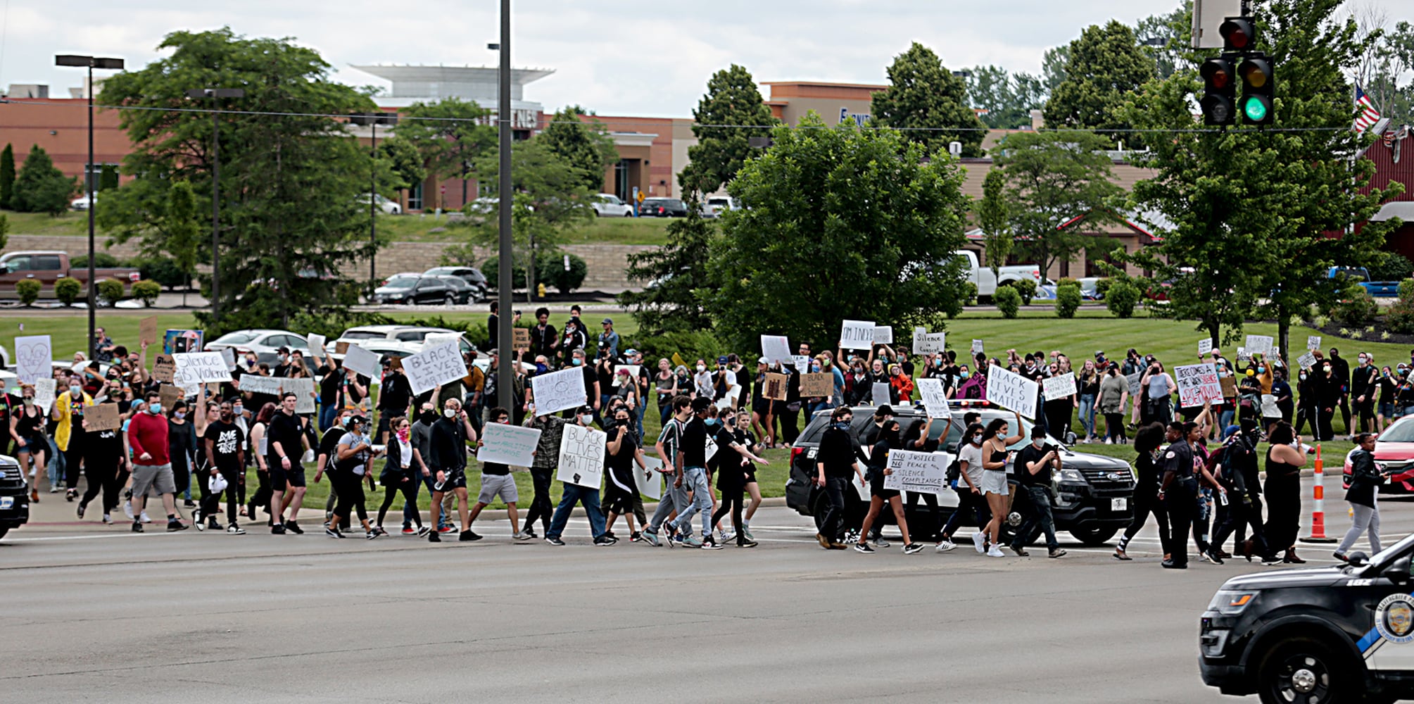 PHOTOS: Demonstrators rally for justice in Beavercreek