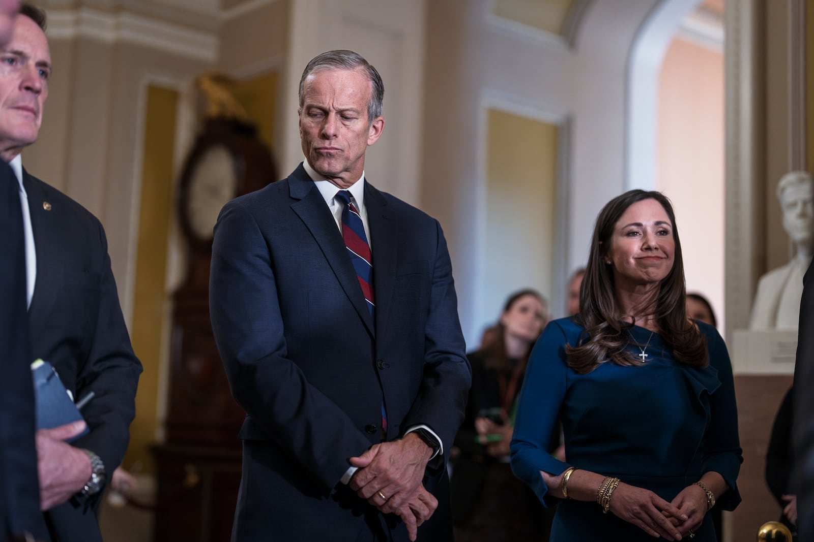 Senate Majority Leader John Thune, R-S.D., stands with Sen. Katie Britt, R-Ala., right, as Republicans talk about immigration during the senate's weekly policy news conference, at the Capitol, in Washington, Tuesday, Jan. 14, 2025. (AP Photo/J. Scott Applewhite)