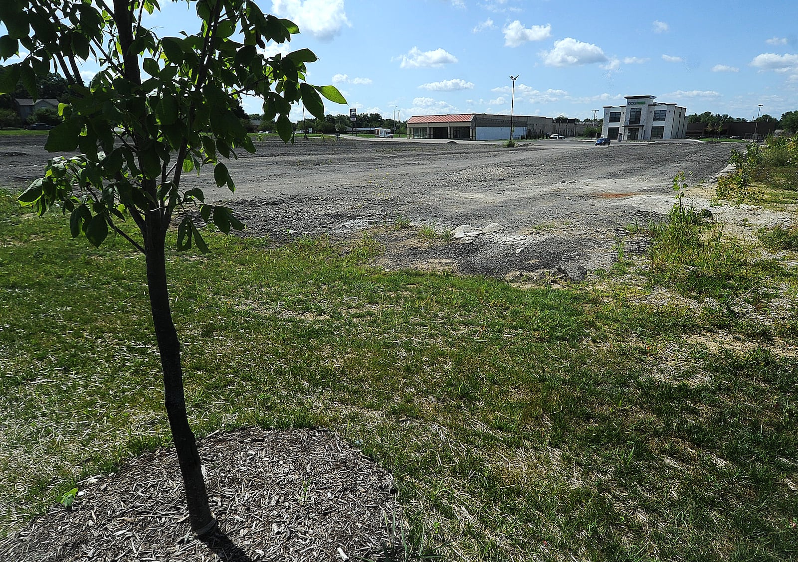 Construction on the Marian Meadows redevelopment project in Huber Heights was supposed to start last year. Work has not begun and the site is vacant. MARSHALL GORBY\STAFF