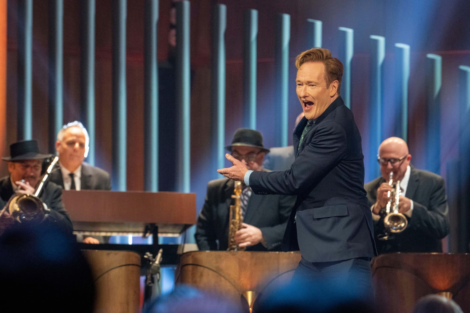 Comedian Conan O'Brien walks out on stage at the start of the 25th Annual Mark Twain Prize for American Humor Celebrating Conan O'Brien, Sunday, March 23, 2025, at the Kennedy Center for the Performing Arts in Washington. (AP Photo/Kevin Wolf)