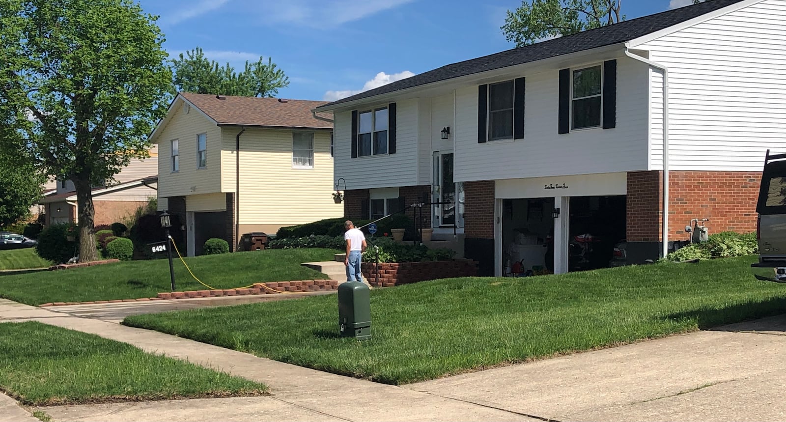 Spencer Keel and many other residents of Trotwood's Westbrooke Village neighborhood take meticulous care of their properties after renovating or rebuilding in the wake of the 2019 tornadoes. JEREMY P. KELLEY / STAFF