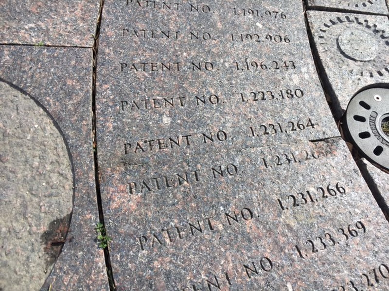 A few of Charles Kettering’s patents, etched for posterity in the Dayton Inventors Riverwalk at Riverscape. THOMAS GNAU/STAFF