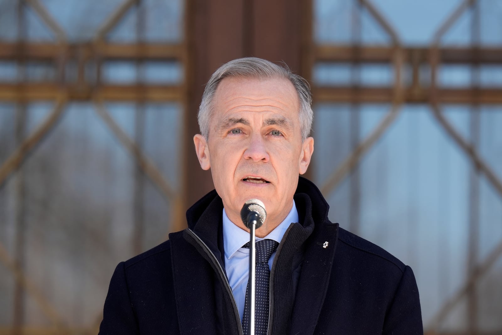 Prime Minister Mark Carney speaks to media at Rideau Hall, where he asked the Governor General to dissolve Parliament and call an election, in Ottawa, Sunday, March 23, 2025. THE CANADIAN PRESS/Adrian Wyld/The Canadian Press via AP) /The Canadian Press via AP)