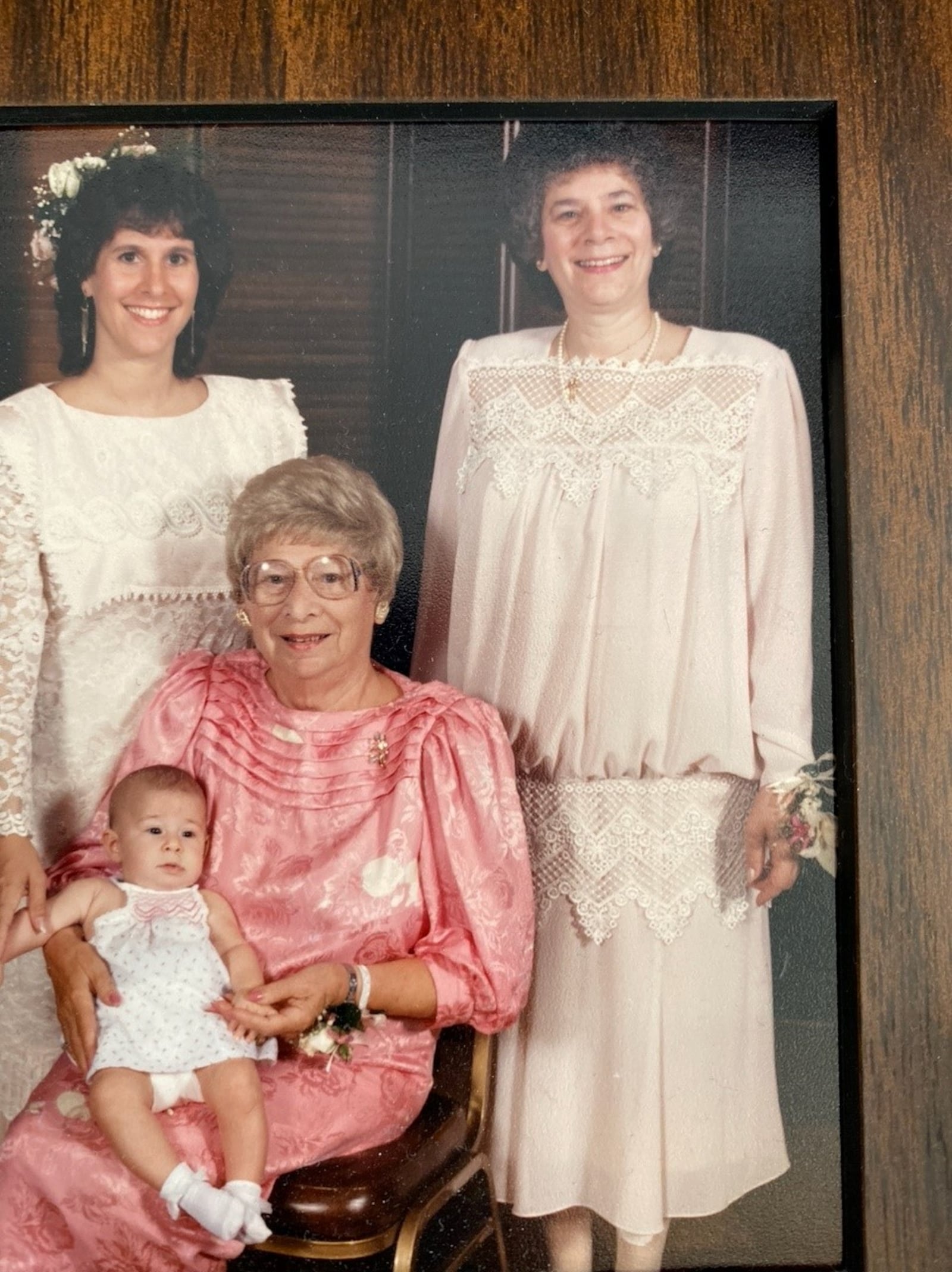 Sarah Routman, left, with her mother Connie Blum, right. Seated in pink is Connie’s mother. The baby is Sarah’s daughter.