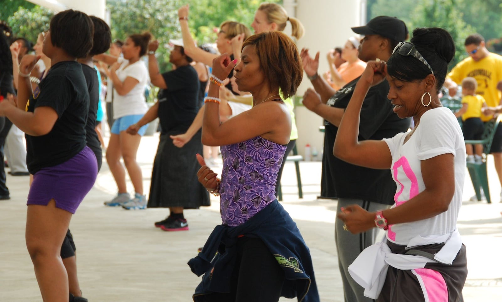 Participants enjoy a Fitness in the Park class at RiverScape MetroPark from a previous summer. This year, the classes are being held virtually because of the coronavirus pandemic.  CONTRIBUTED