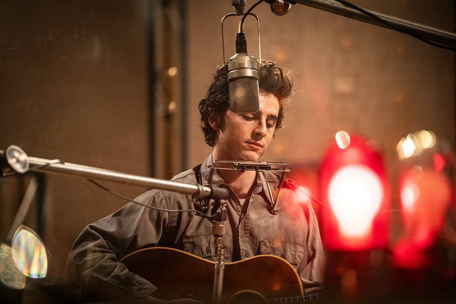 This image released by Searchlight Pictures shows Timothée Chalamet in a scene from "A Complete Unknown." (Macall Polay/Searchlight Pictures via AP)