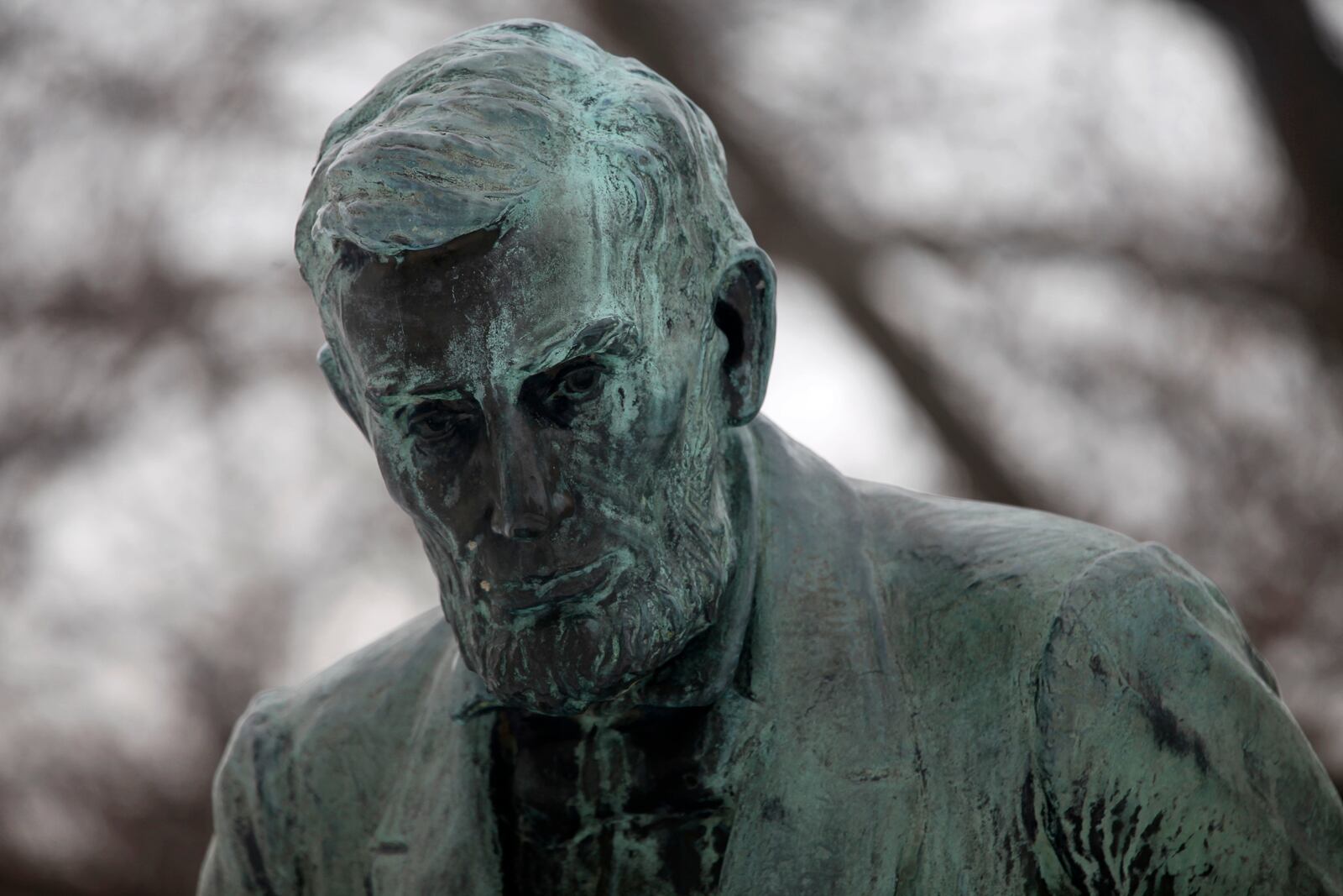 This photo from Friday, Feb. 14, 2025, shows the face of a statue honoring Abraham Lincoln, the president who kept the Union intact during the Civil War, on the Kansas Statehouse grounds, in Topeka, Kansas. (AP Photo/John Hanna)