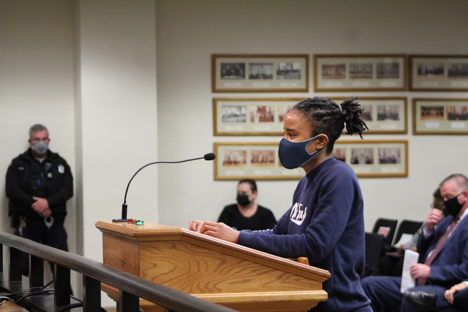 Jo Cooley-Love asks the city of Dayton to extend the deadline for applications for rescue funds at a recent city commission meeting. CORNELIUS FROLIK / STAFF