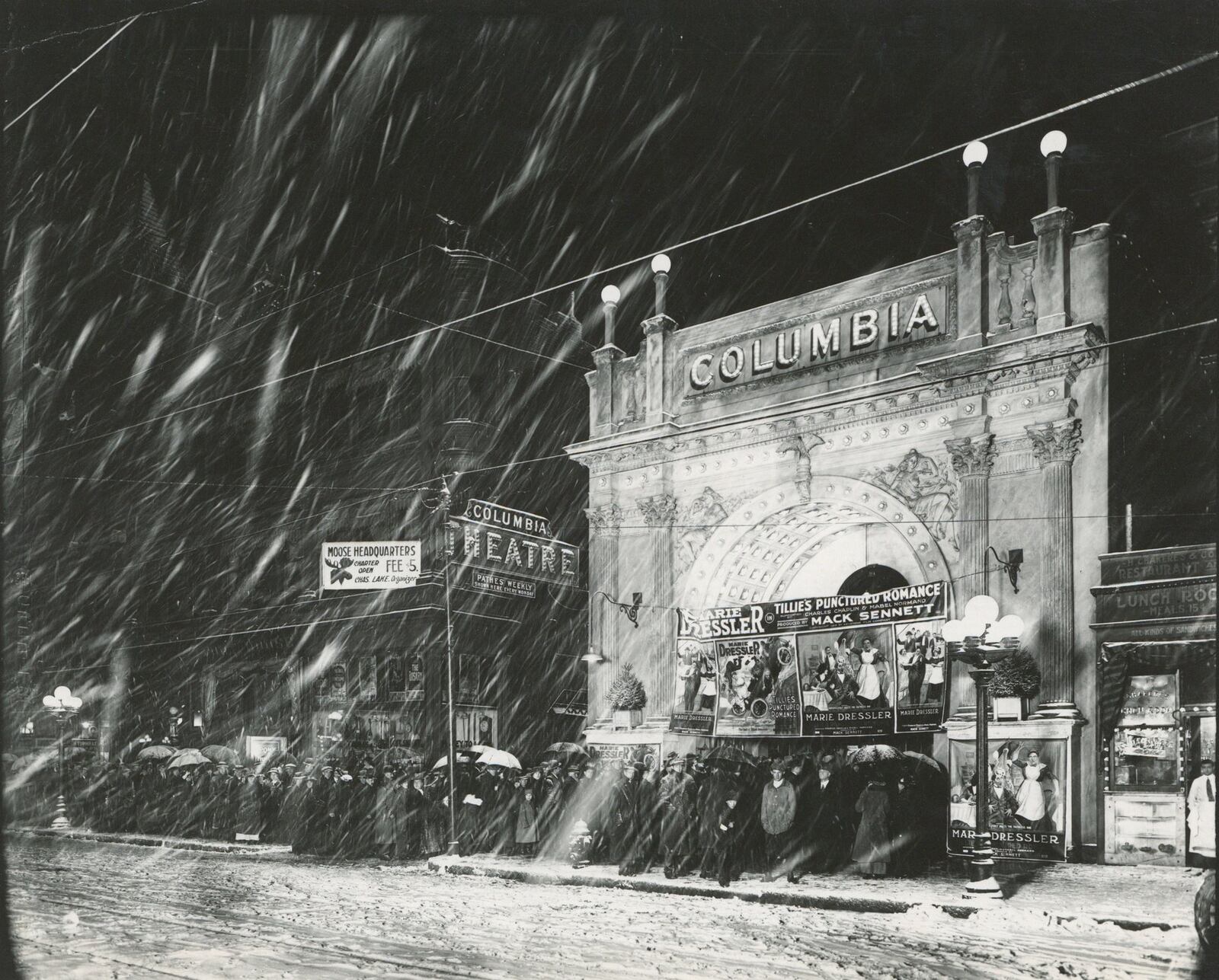 Columbia Theater during snow storm, 1914. Photo by William Preston Mayfield. On loan from Cristina and Ren Egbert.