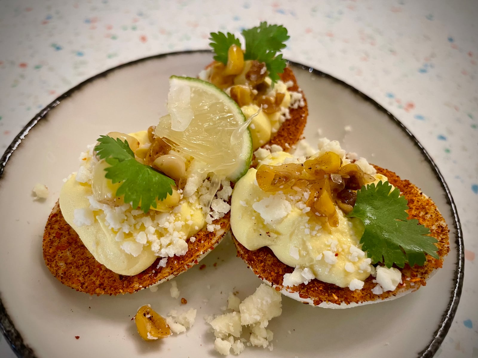 Elote Deviled Eggs are one of several items on the menu at Joui Wine. NATALIE JONES/STAFF