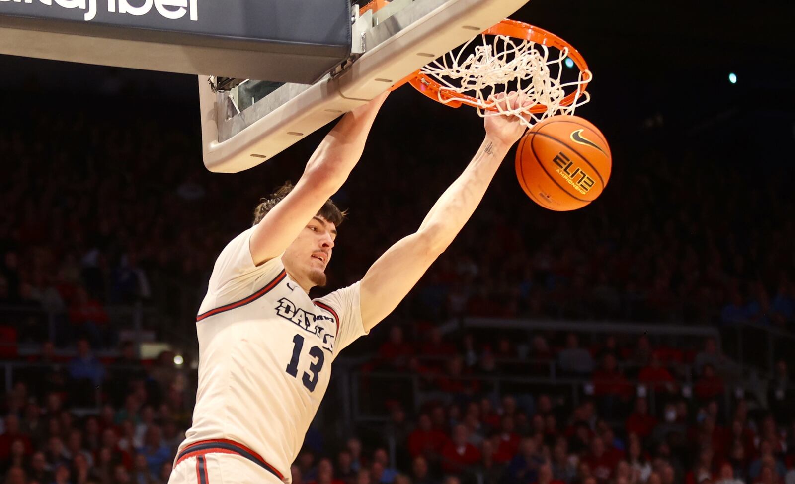 Dayton's Isaac Jack dunks against Youngstown State on Friday, Nov. 24, 2023, at UD Arena. David Jablonski/Staff