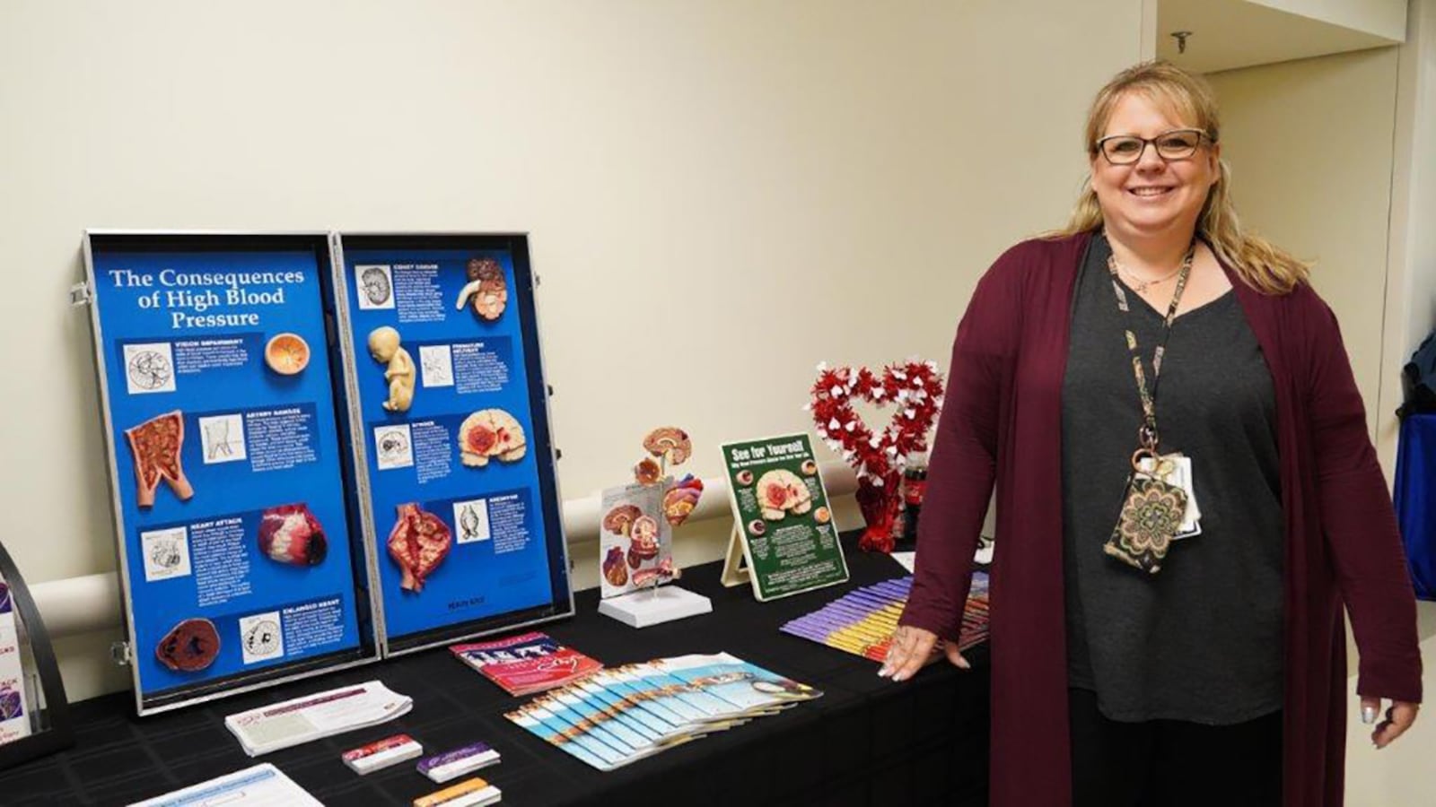 Melissa Timberman, 88th Medical Group disease manager, staffs a booth during Women’s Wellness Day on Oct. 7 at the Women’s Health Clinic. The informational booth was set up to offer women guidance and literature on preventing and managing chronic diseases caused by obesity, heart disease, diabetes and high blood pressure. U.S. AIR FORCE PHOTO/KENNETH STILES