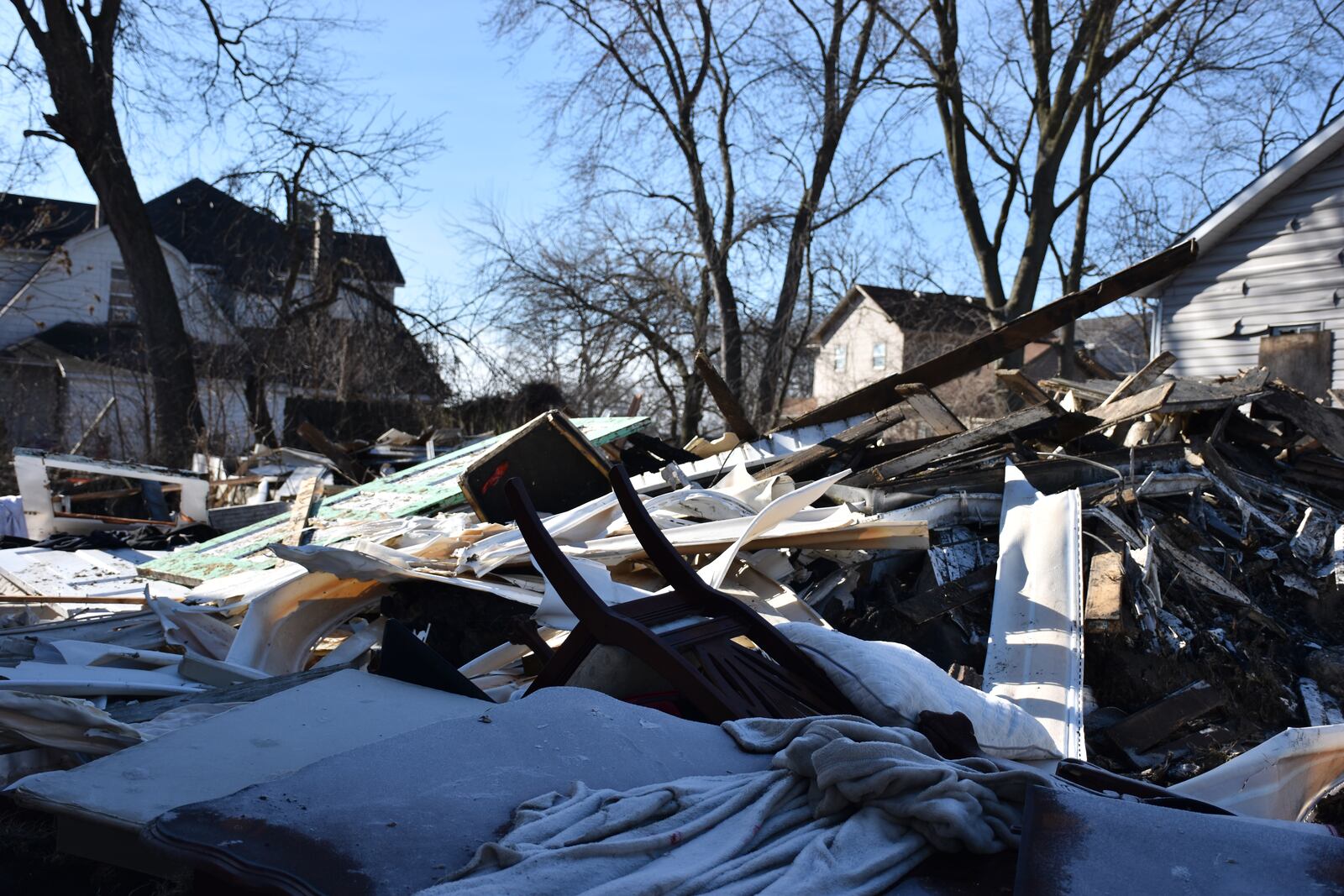 A fire pile in East Dayton CORNELIUS FROLIK / STAFF