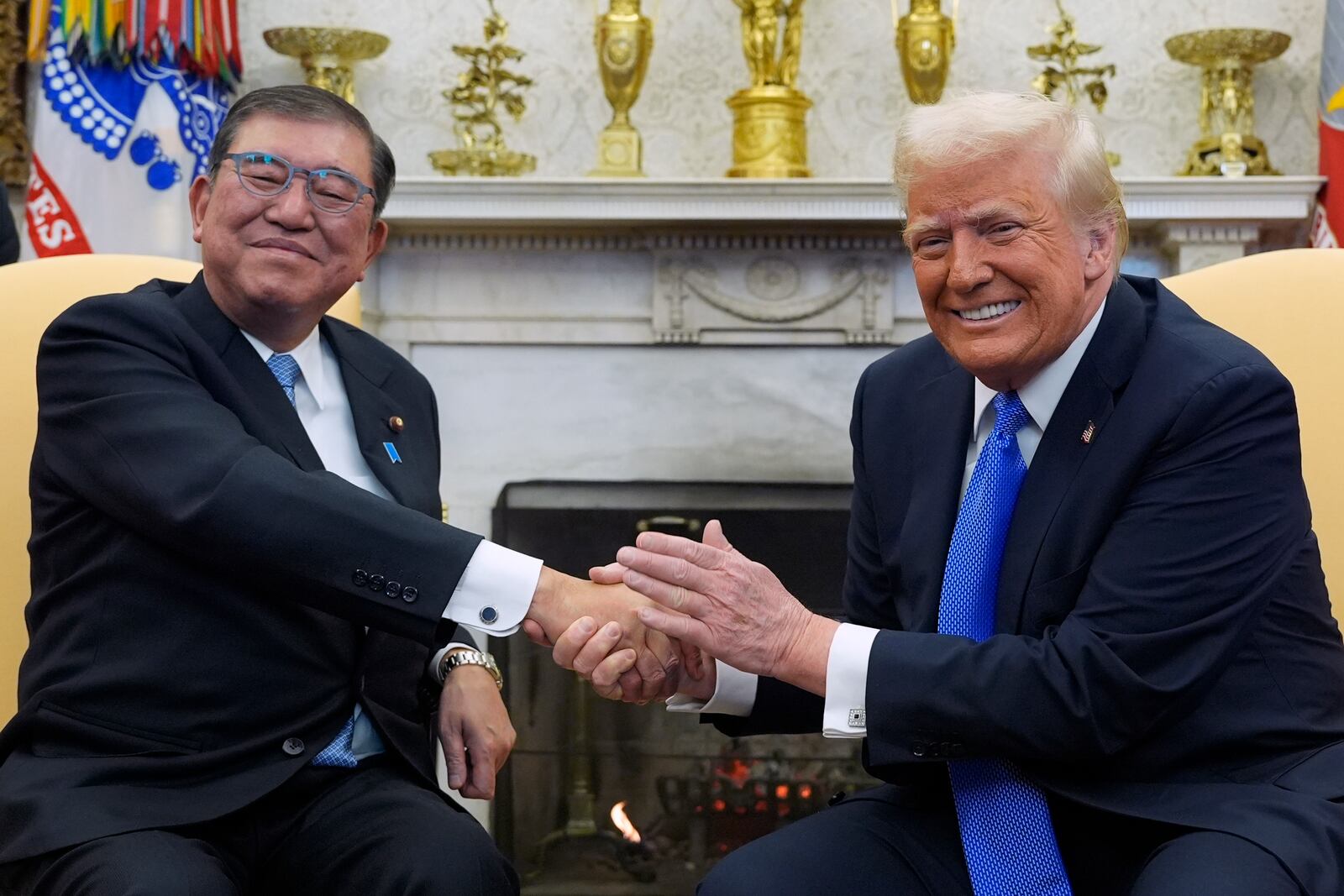 President Donald Trump meets with Japanese Prime Minister Shigeru Ishiba in the Oval Office of the White House, Friday, Feb. 7, 2025, in Washington. (AP Photo/Alex Brandon)