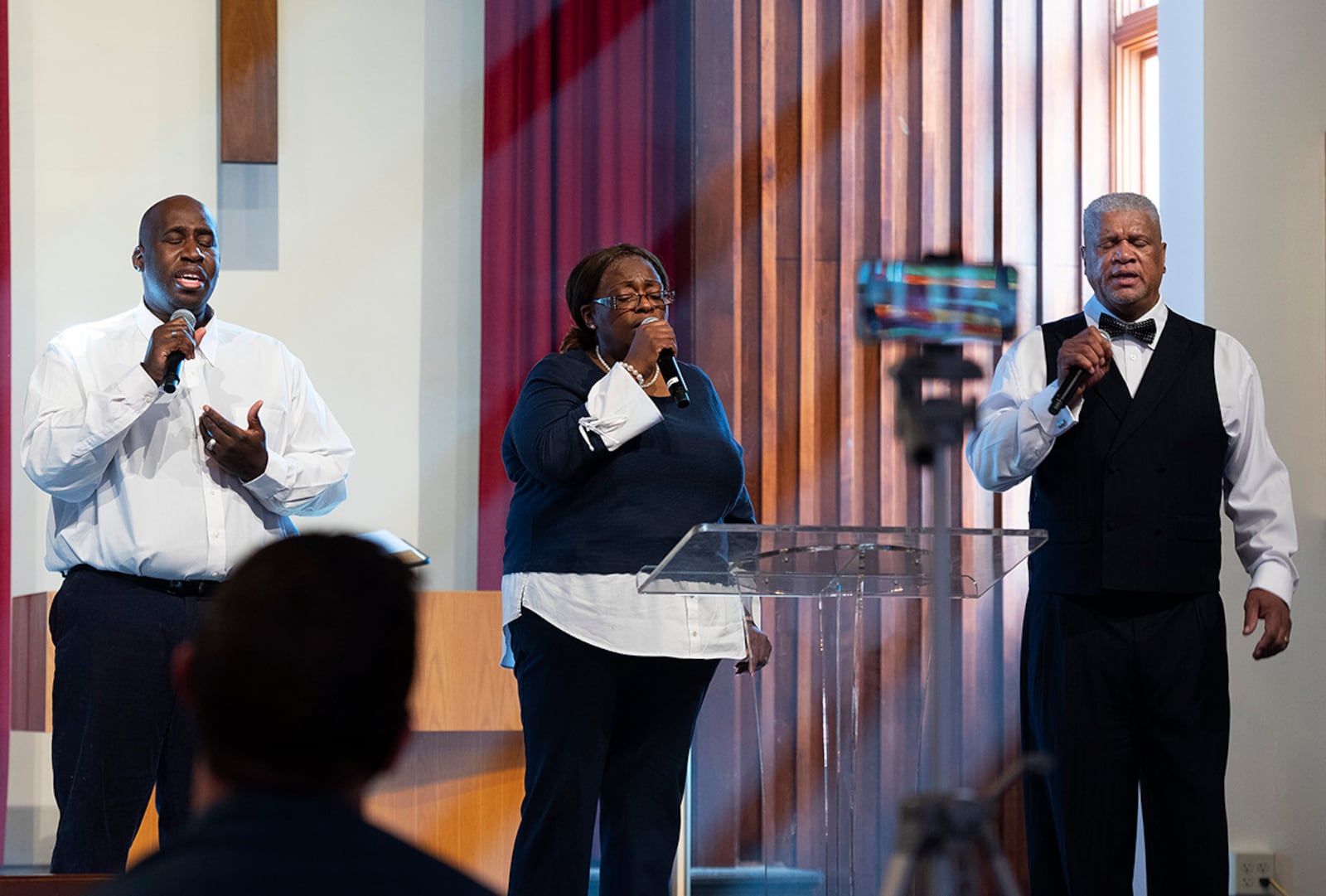 Vincent Nelson (left), Del Gillespie and Carl Scott sing a hymn during the Protestant service Feb. 27 in Kittyhawk Chapel at Wright-Patterson Air Force Base. U.S. AIR FORCE PHOTO/R.J. ORIEZ