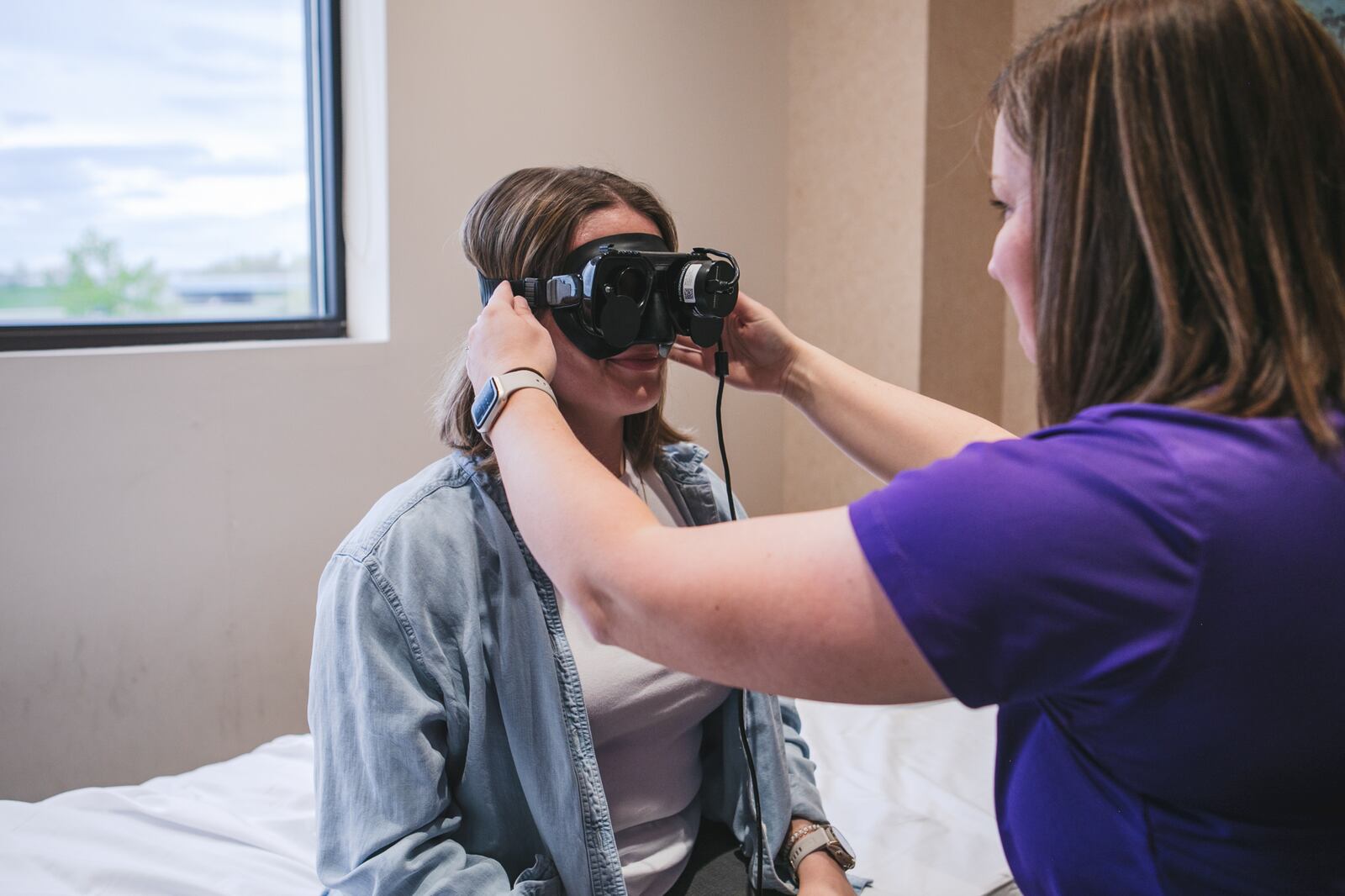 A physical therapist helps a patient at the Kettering Health NeuroRehab and Balance Center, located at 7677 Yankee St. in Centerville, which is starting a residency program for neurologic physical therapy. The center helps people regain mobility following neurologic disorders or injuries. More neurologic physical therapists are needed in rural areas to hit the target populations in need of this care. COURTESY OF KETTERING HEALTH