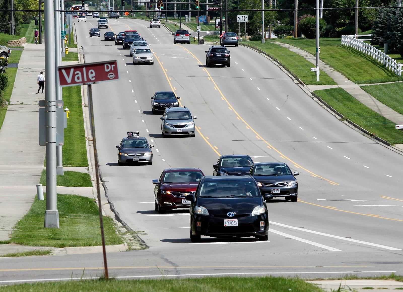 Traffic flows freely on the five-lane section of County Line Road, with the Miami Valley Research Park near the top left of the photo. In the past year, Beavercreek and Kettering have been widening the stretch of County Line that runs from Vale Drive (pictured) to Dorothy Lane, right by The Greene Town Center. FILE