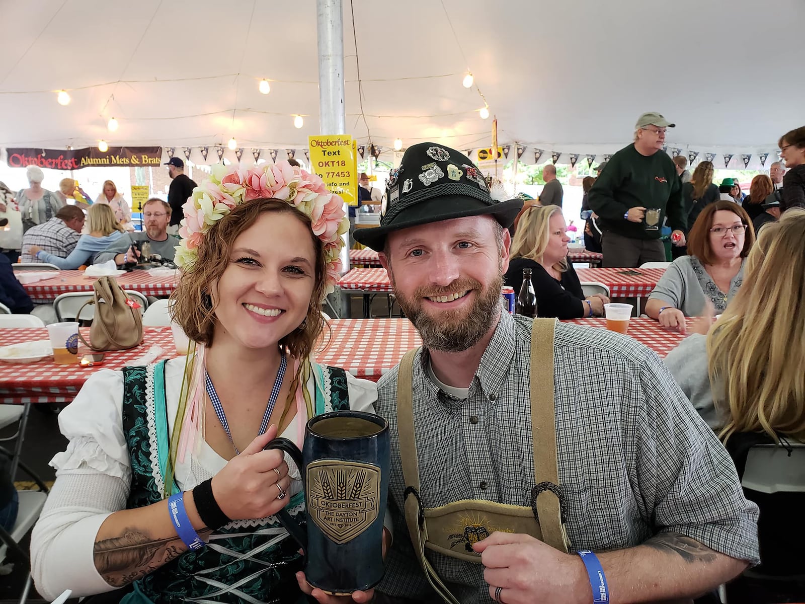 Jen (L) and Ian (R) volunteering at the Dayton Art Institute Oktoberfest in 2021.