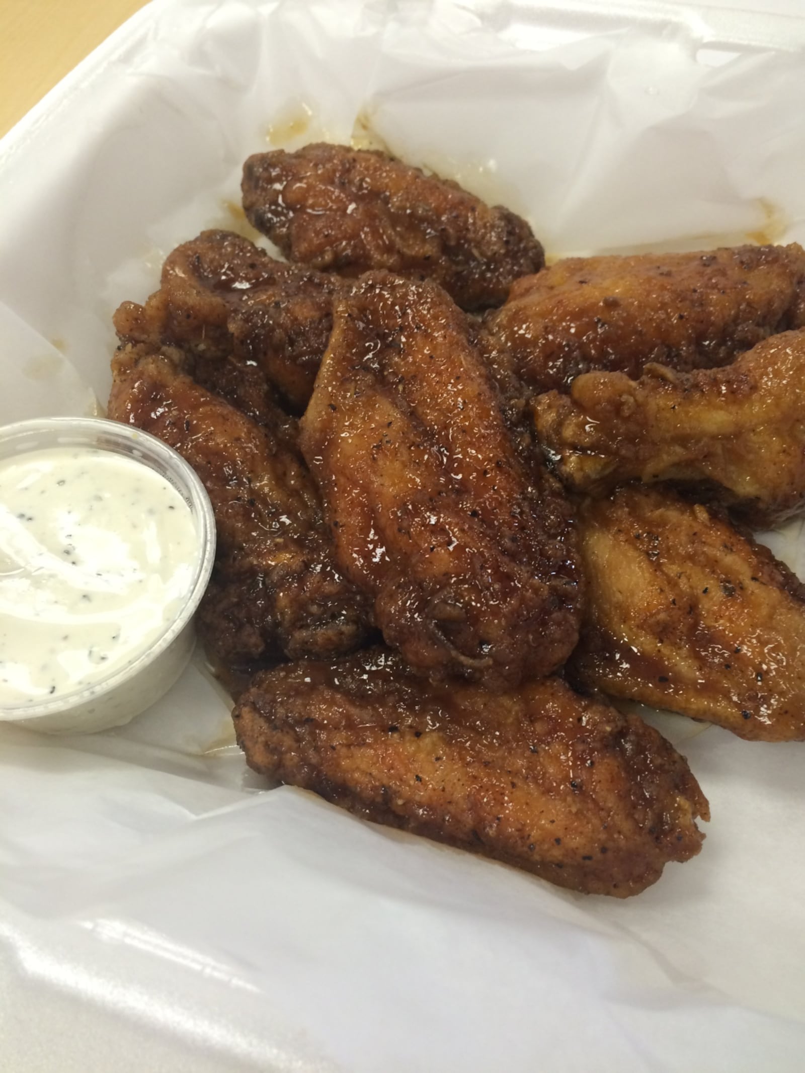 Blind Bob's bourbon wings are hand-breaded, crispy wings with an incredible sauce. VIVIENNE MACHI/STAFF