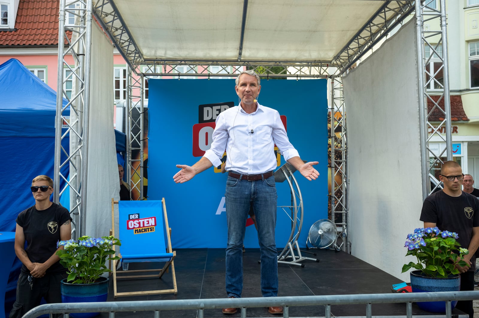 FILE - Bjoern Hoecke, top candidate of the far-right Alternative for Germany party, AfD, is surround by private security guards as he speaks on an election campaign rally of the party for upcoming state elections in Suhl, Germany, Aug. 13, 2024. (AP Photo/Markus Schreiber)