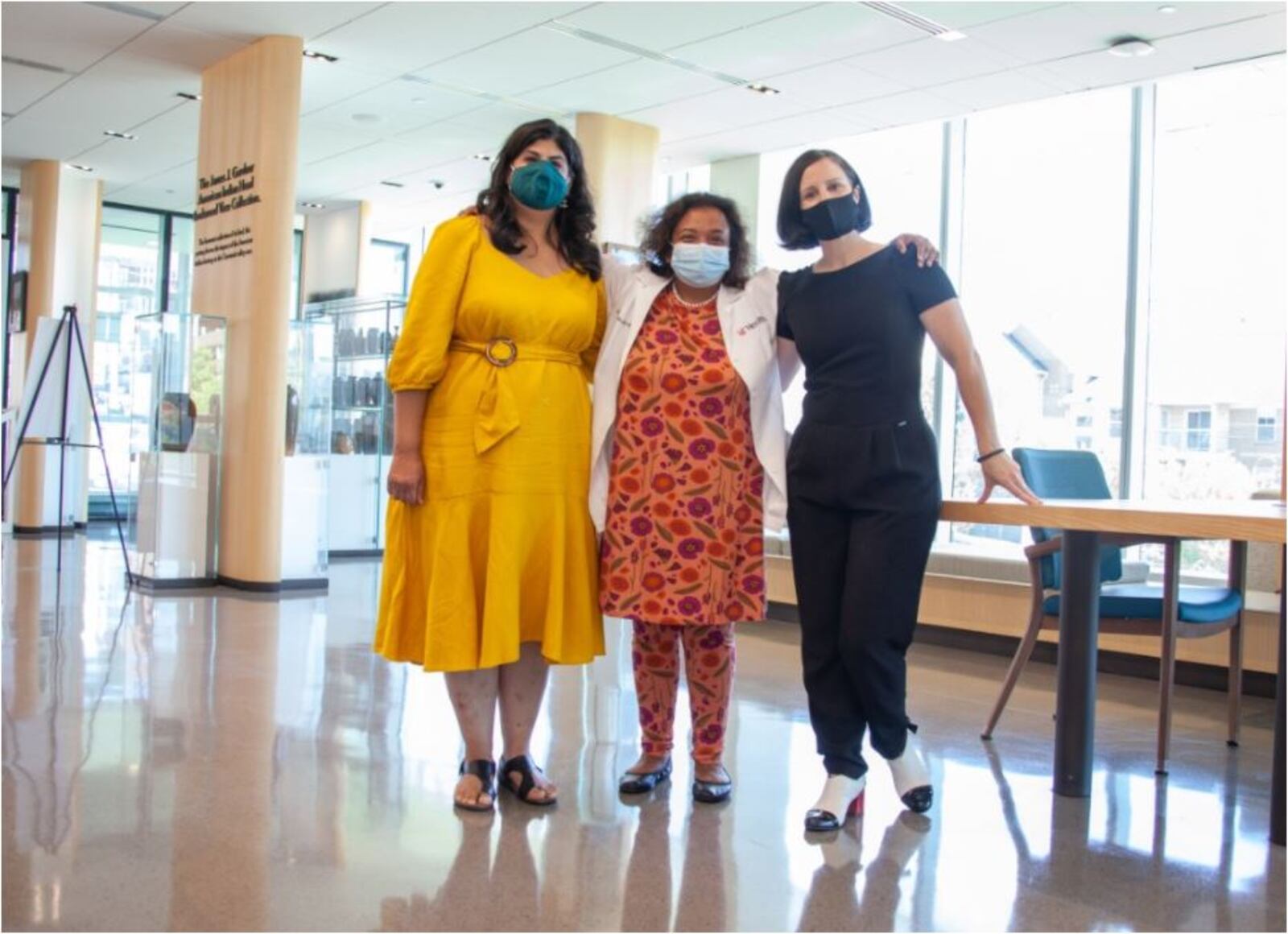 Three University of Cincinnati researchers, from left, Meera Rastogi, Dr. Soma Sengupta and Claudia Rebola combined expertise from their respective disciplines to study alleviating depression using robotic dogs and art therapy. PROVIDED