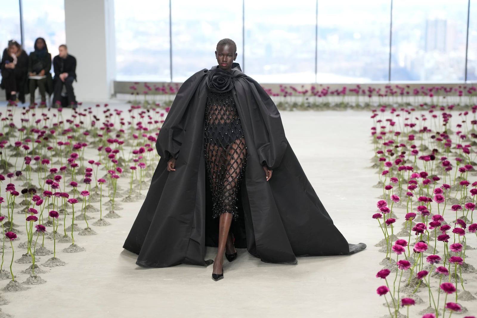 A model walks the runway during the Carolina Herrera Fall/Winter 2025 fashion show as part of New York Fashion Week on Monday, Feb. 10, 2025, in New York. (Photo by Charles Sykes/Invision/AP)